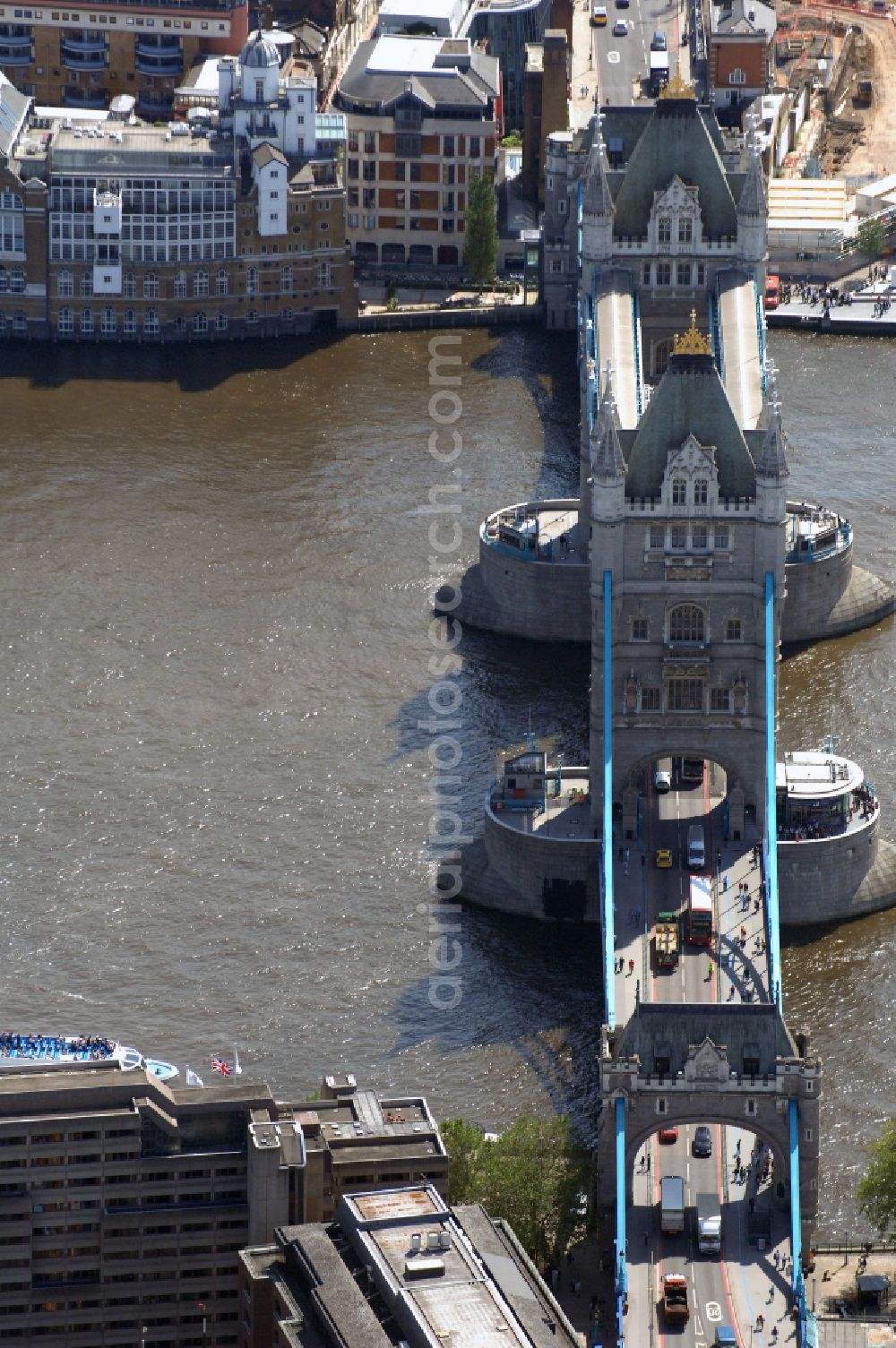 London from the bird's eye view: River - bridge structure and landmark of the Victorian bascule and suspension bridge Tower Bridge for crossing the river Thames on Tower Bridge Rd in London in England, United Kingdom