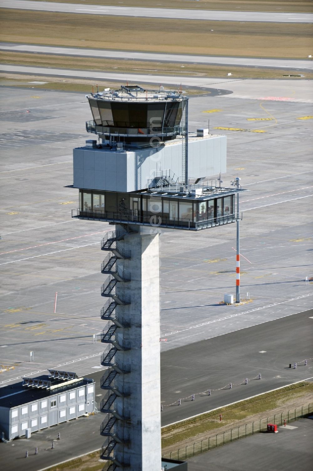 Schönefeld from the bird's eye view: Tower of DFS German Air Traffic Control GmbH on the runways of the BER Airport in Schoenefeld in Brandenburg