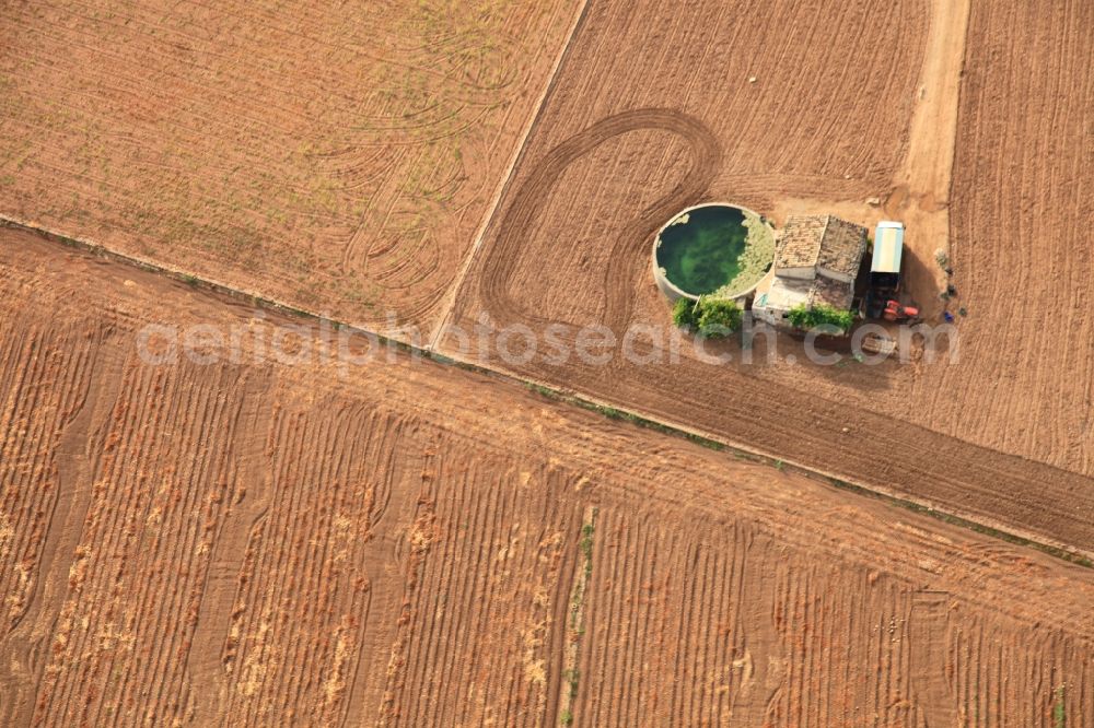 Aerial photograph Manacor - Traditional water - reservoir on the fields of Mallorca at Manacor in Balearic Islands, Spain