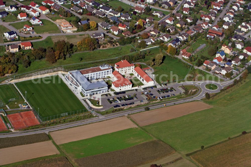 Aerial image Zuzenhausen - Das Trainings- und Geschäftsstellenzentrum der TSG 1899 Hoffenheim am Dietmar-Hopp-Sportpark. Das moderne Trainingszentrum wurde im Herbst 2009 fertiggestellt. Im benachbarten Schlossgebäude wird die U23 betreut. The training center and offices of TSG 1899 Hoffenheim on Dietmar-Hopp-sports park.