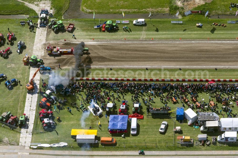 Hensbroek from above - Tractor pulling hard in Hensbroek in North Holland Holland / Netherlands