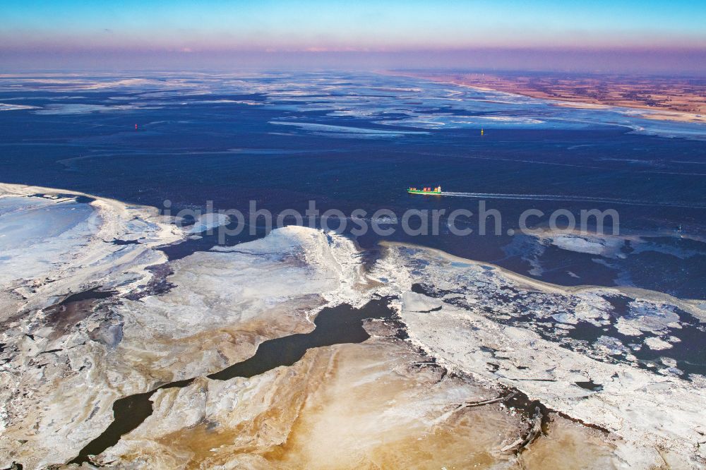 Butjadingen from the bird's eye view: Ice floe pieces of a drift ice layer on the water surface in the North Sea in Butjadingen in the state Lower Saxony, Germany