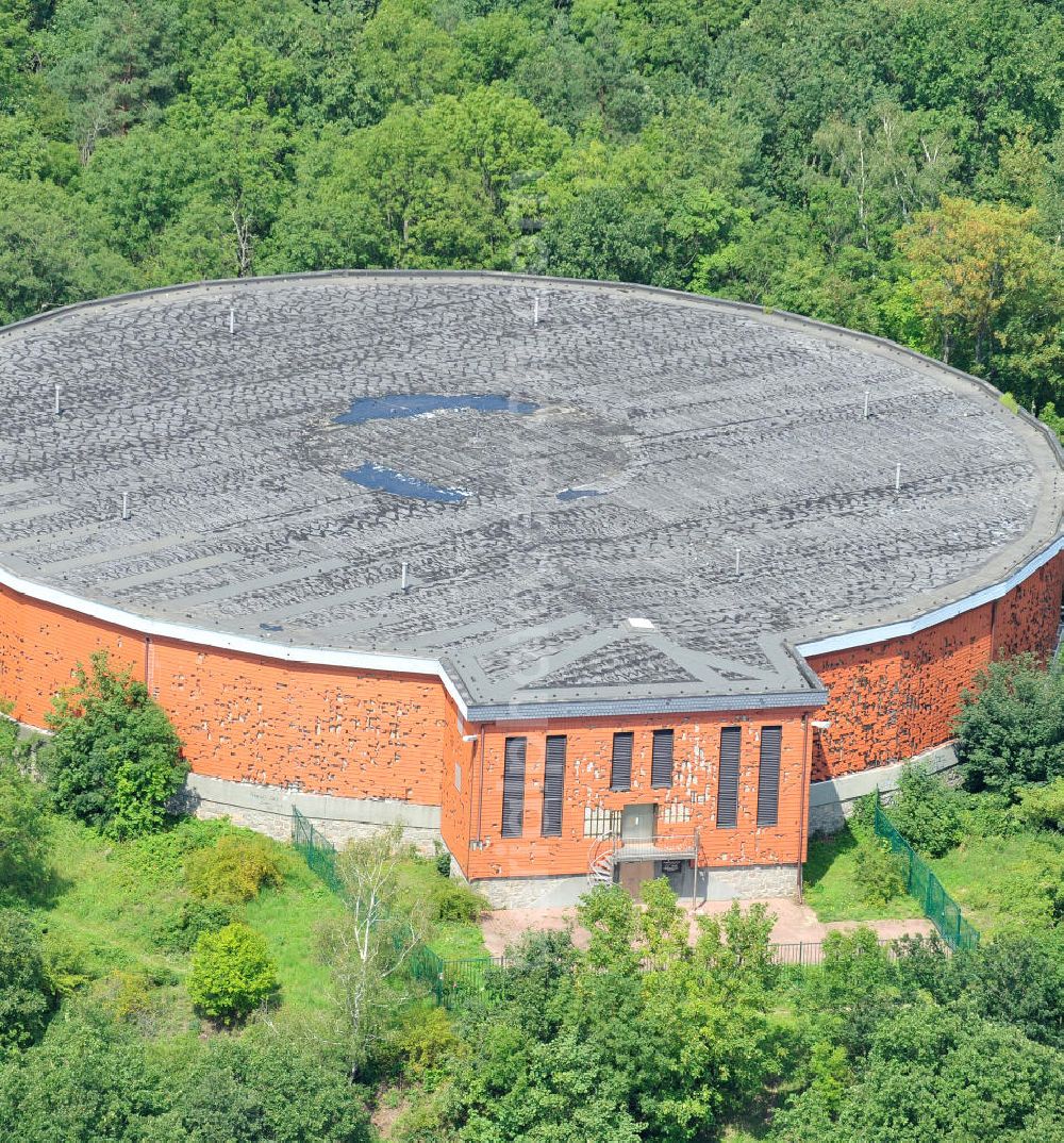 Aerial photograph Muldenstein - The red-clad high-water tank Muldenstein. Serving in GDR times on the Steinberg built storage for drinking water. Inside, there are two water chambers with a total of 8,000 cubic meters of drinking water