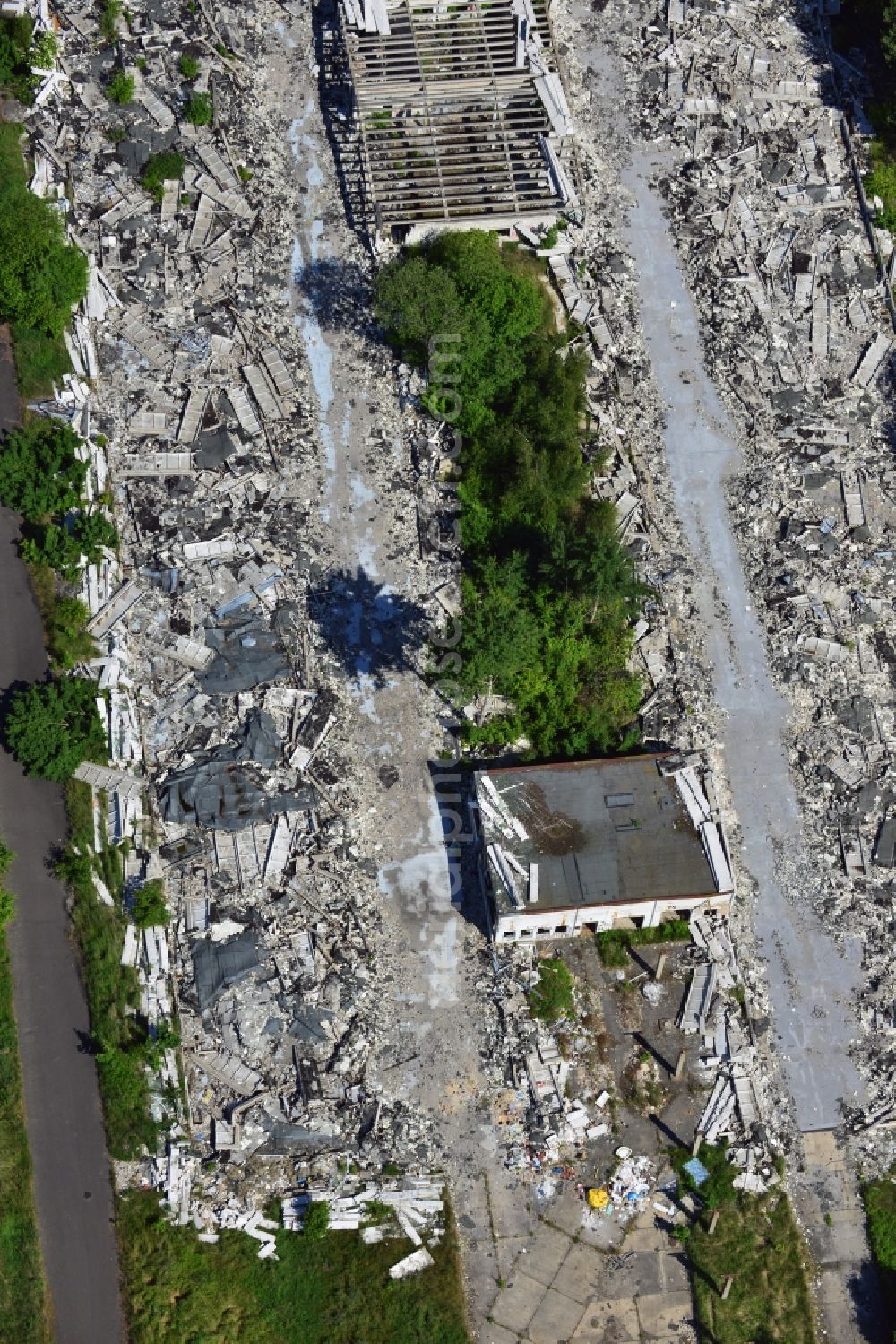 Schönow from the bird's eye view: Rubble remains of the demolished building ruins of former NVA of the GDR properties at Schoenow in Brandenburg