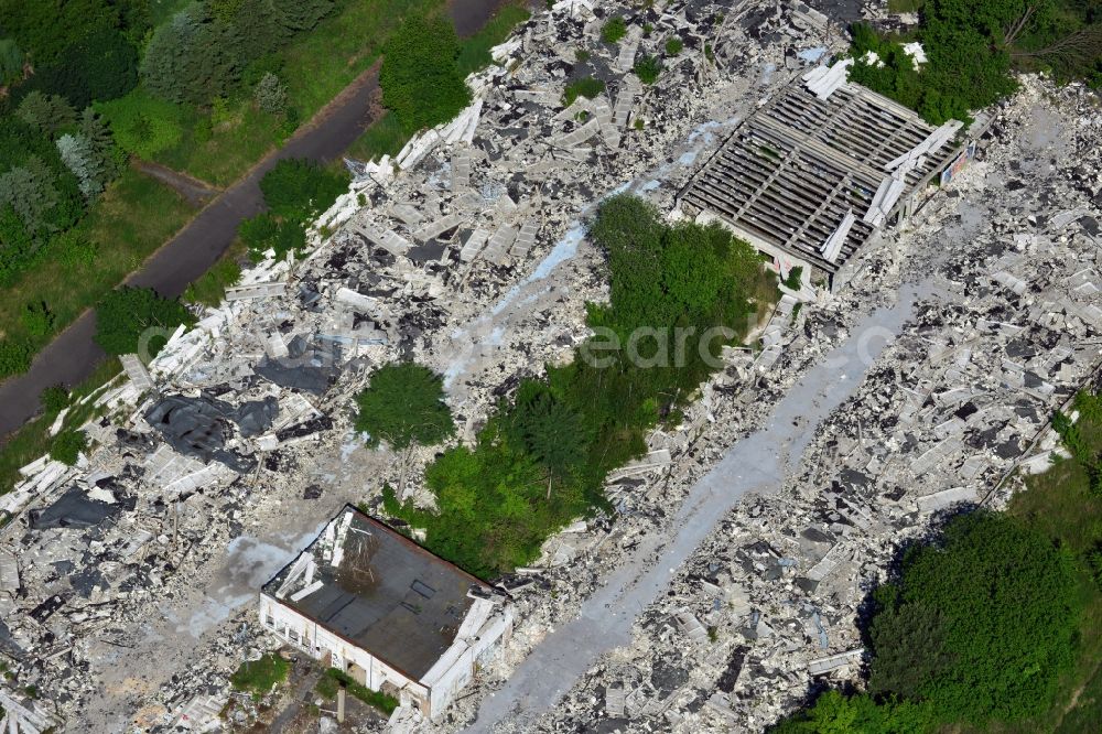 Schönow from the bird's eye view: Rubble remains of the demolished building ruins of former NVA of the GDR properties at Schoenow in Brandenburg