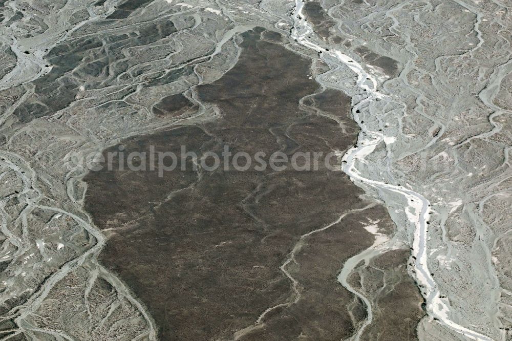 Aerial photograph Nazca - Landscape of the dry desert deformed by soil erosion and traces of water in Nazca in Ica, Peru