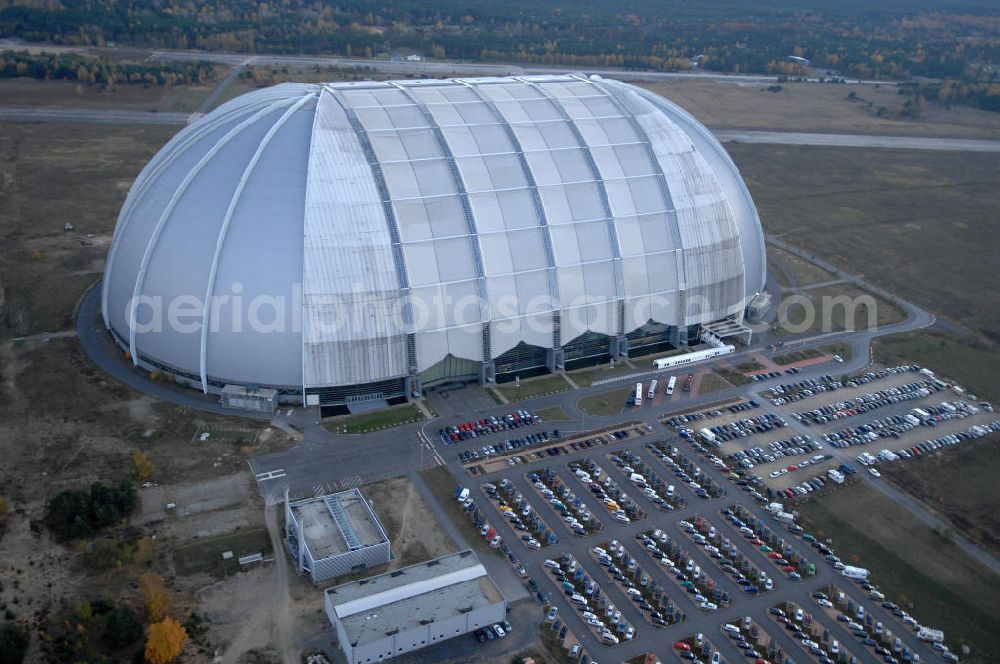 Krausnick from the bird's eye view: Blick auf das Tropical Islands Resort in der Nähe von Krausnick in Brandenburg. Dieses Resort im Licht des Sonnenuntergangs ist ein als künstliche Tropenlandschaft angelegter Freizeitpark in der größten freitragenden Halle der Welt, 60 km südlich von Berlin. Postanschrift: Tropical Island Management GmbH, Tropical-Islands-Allee 1, 15910 Krausnick, Tel. (+49) 03 54 77 - 60 50 50,