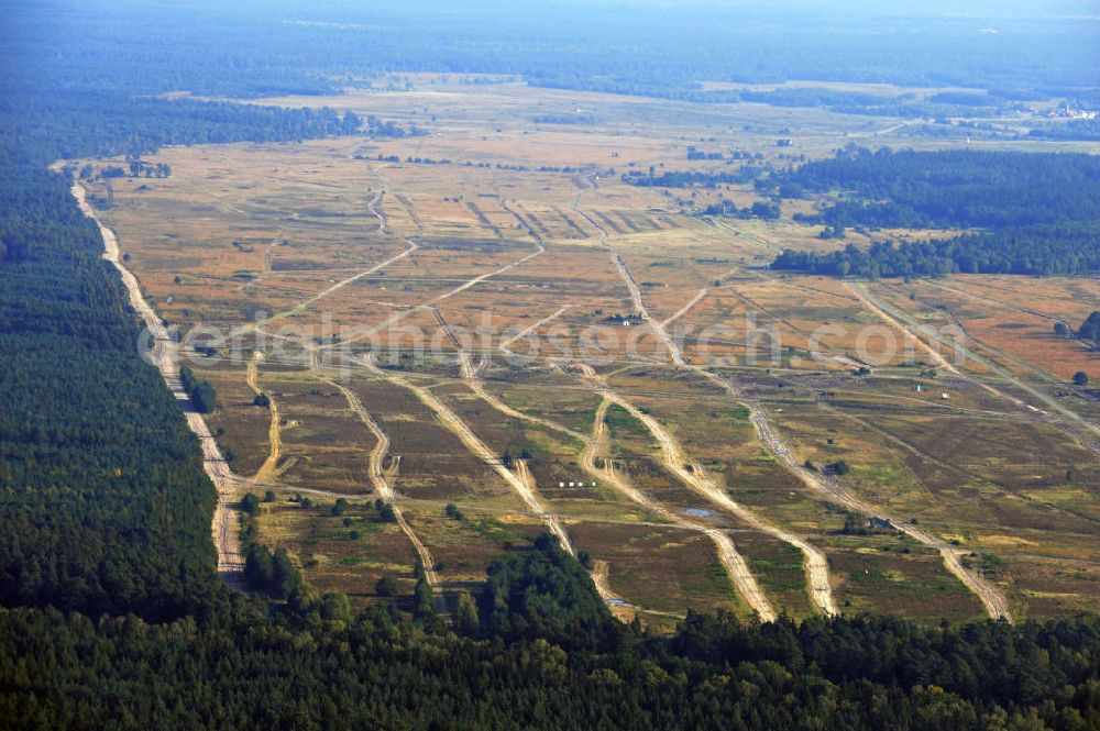 Aerial photograph Munster - Der Truppenübungsplatz TrÜbPl Munster-Nord ist ein deutsches Manövergelände in der Lüneburger Heide in Niedersachsen. Auf dem Übungsplatz befinden sich Schießbahnen für die Gefechtsausbildung gepanzerter Fahrzeuge, welche überwiegend aus Sand- und Heideflächen bestehen. Military training area Munster-North, a german exercise area in the Lueneburg Heath in Lower Saxony.