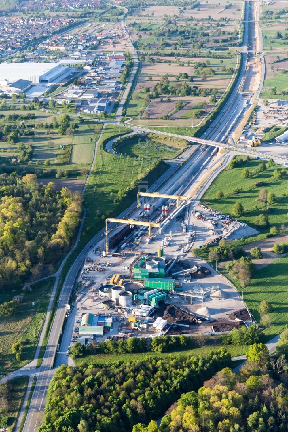 Ötigheim from above - Construtcion work on a rail tunnel track in the route network of the Deutsche Bahn in Oetigheim in the state Baden-Wurttemberg, Germany