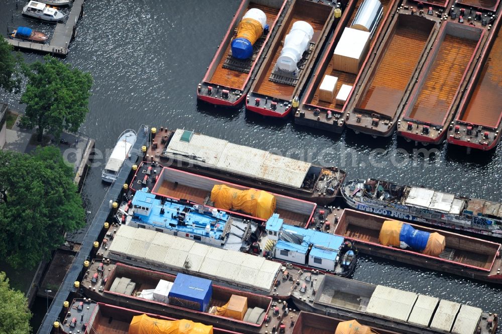 Berlin from the bird's eye view: View of the inland waterway transshipment point Rummelsburg in Berlin Rummelsburg. Great product charges such as mega-turbines for power plants here are loaded and shipped by barge