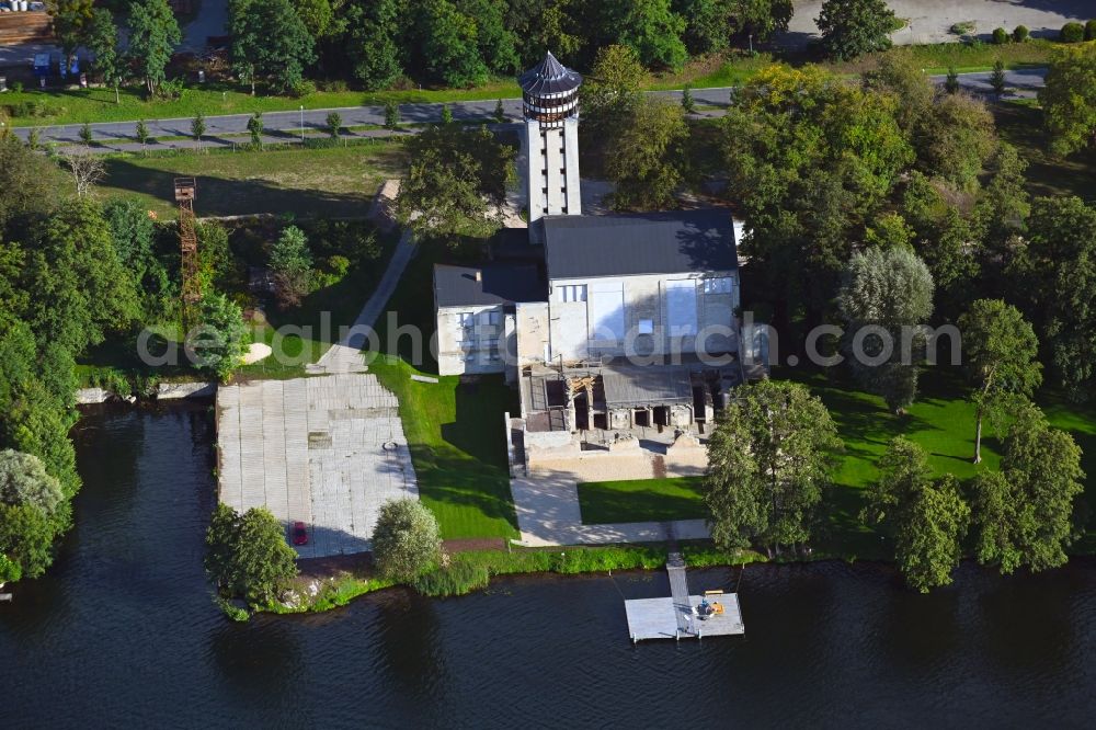 Hennickendorf from the bird's eye view: Ruin the buildings and halls of a turbine hall on Berliner Strasse on the banks of the Stienitzsee in Hennickendorf in the state Brandenburg, Germany