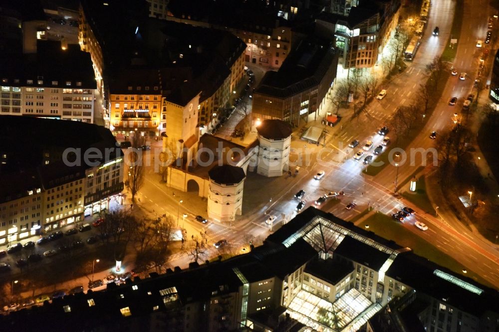 München from the bird's eye view: Night view Tower building Isartor on Isartorplatz the rest of the former historic city walls in Munich in the state Bavaria