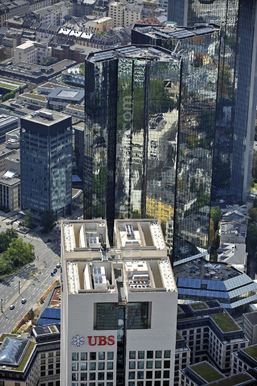 Frankfurt am Main from above - Blick auf den UBS-Tower und die Deutsche Bank Tower im Hintergrund. View of the UBS Tower and the Deutsche Bank Towers in the background.