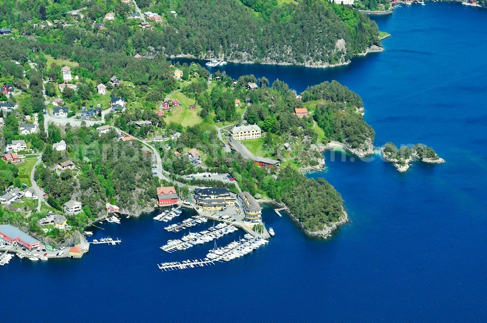 Os from the bird's eye view: View of the shore of the on a peninsula located municipality Os in the province of Hordaland in Norway