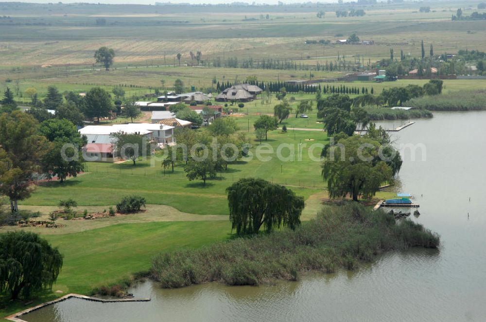 Aerial photograph LOCHVAAL - Nearshore marine environment of the Marlbank River near Sasolburg, South Africa. The river is located near N1 Road, the main road linking Johannesburg and Cape Town