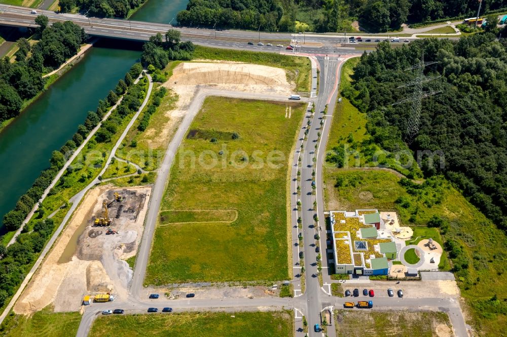 Gelsenkirchen from the bird's eye view: Shore area of the Rhine-Herne Canal at development area - site of the former Graf Bismarck colliery in Gelsenkirchen in North Rhine-Westphalia