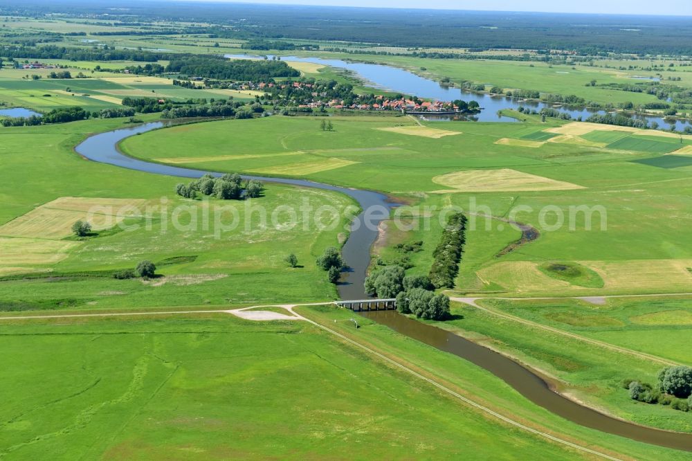 Schnackenburg from above - Curved loop of the riparian zones on the course of the river Aland in Schnackenburg in the state Lower Saxony, Germany