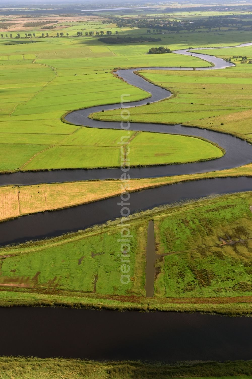 Meggerdorf from the bird's eye view: Curved loop of the riparian zones on the course of the river Alte Sorge in Meggerdorf in the state Schleswig-Holstein