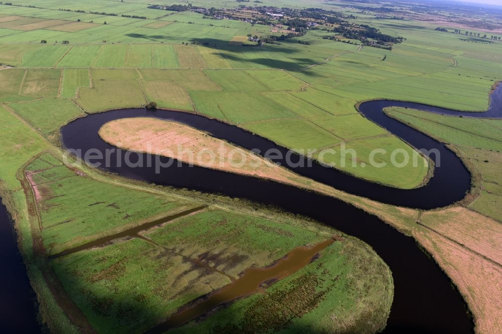 Meggerdorf from the bird's eye view: Curved loop of the riparian zones on the course of the river Alte Sorge in Meggerdorf in the state Schleswig-Holstein