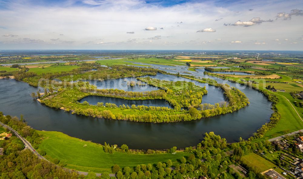 Birten from the bird's eye view: Curved loop of the riparian zones on the course of the river Old Rhine in Birten in the state North Rhine-Westphalia, Germany