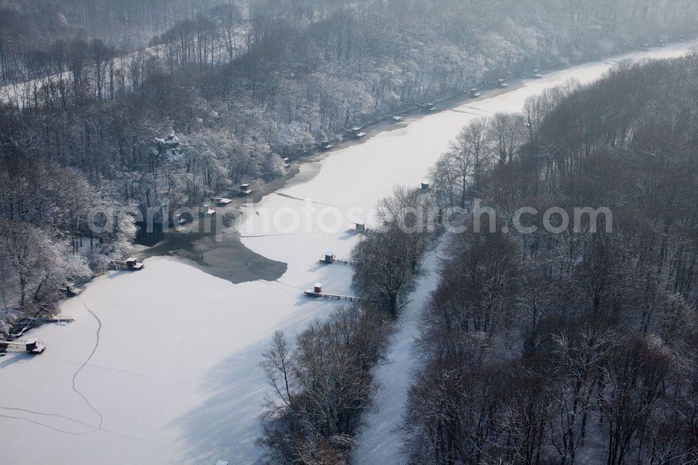 Aerial image Wörth am Rhein - Riparian zones on the course of the frozen river old rhine with bridges for anglers in the district Industriegebiet Woerth-Oberwald in Woerth am Rhein in the state Rhineland-Palatinate