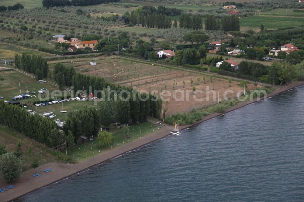 Aerial image Val di Lago - Shore areas of Lake Bolsena in Val di Lago in Latium in Italy. It is characterized by farms and facilities of tourism