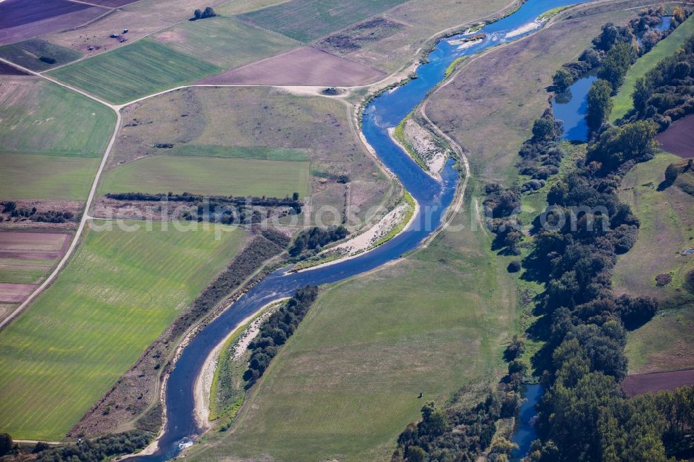 Ertingen from above - Curved loop of the riparian zones on the course of the river Danube in Ertingen in the state Baden-Wurttemberg, Germany