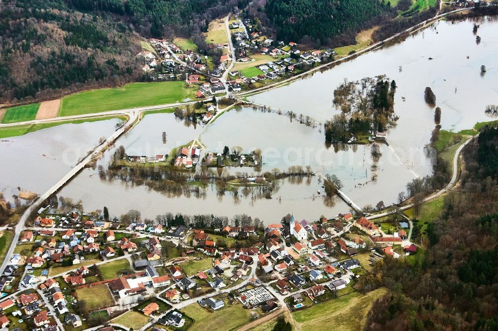 Aerial image Regenstauf - Riverside areas with flooded flood level of the river and the adjacent football field - sports field in the district Kleinramspau in Regenstauf in the state of Bavaria, Germany