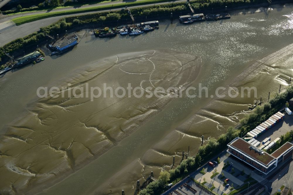 Hamburg from above - Shore areas exposed by low-water level riverbed the Elbe in the harbor basin of Spreehafen in Hamburg in Germany