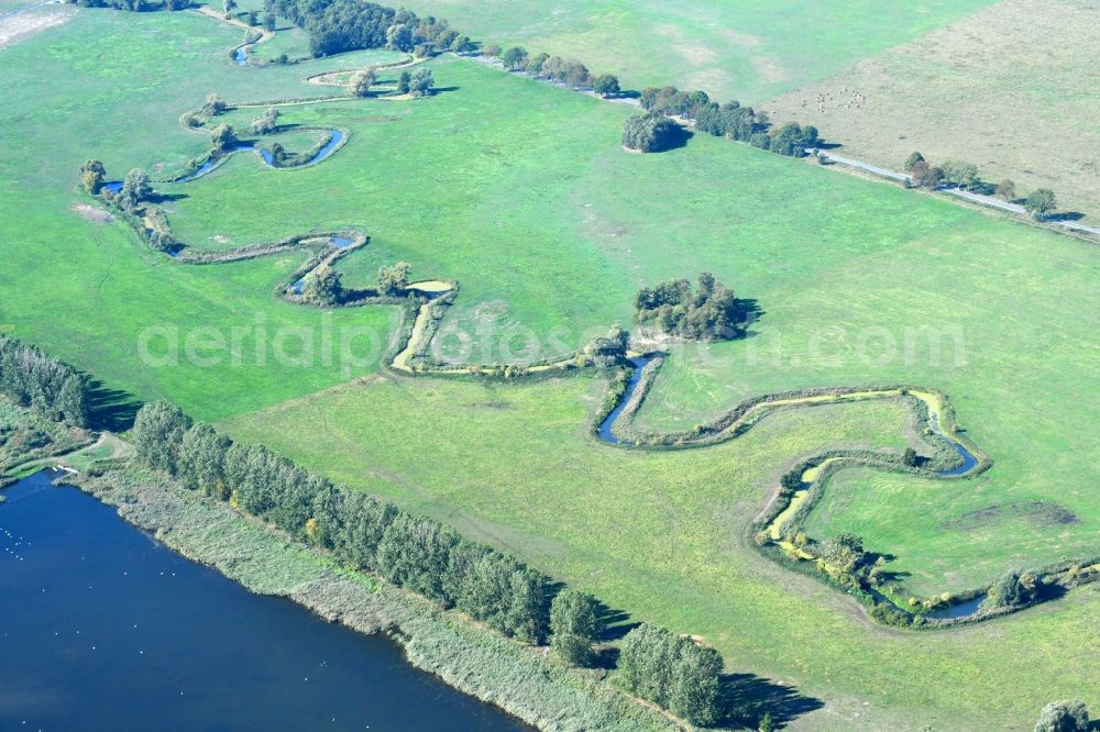 Aerial image Raduhn - Curved loop of the riparian zones on the course of the river of Elde in Raduhn in the state Mecklenburg - Western Pomerania, Germany