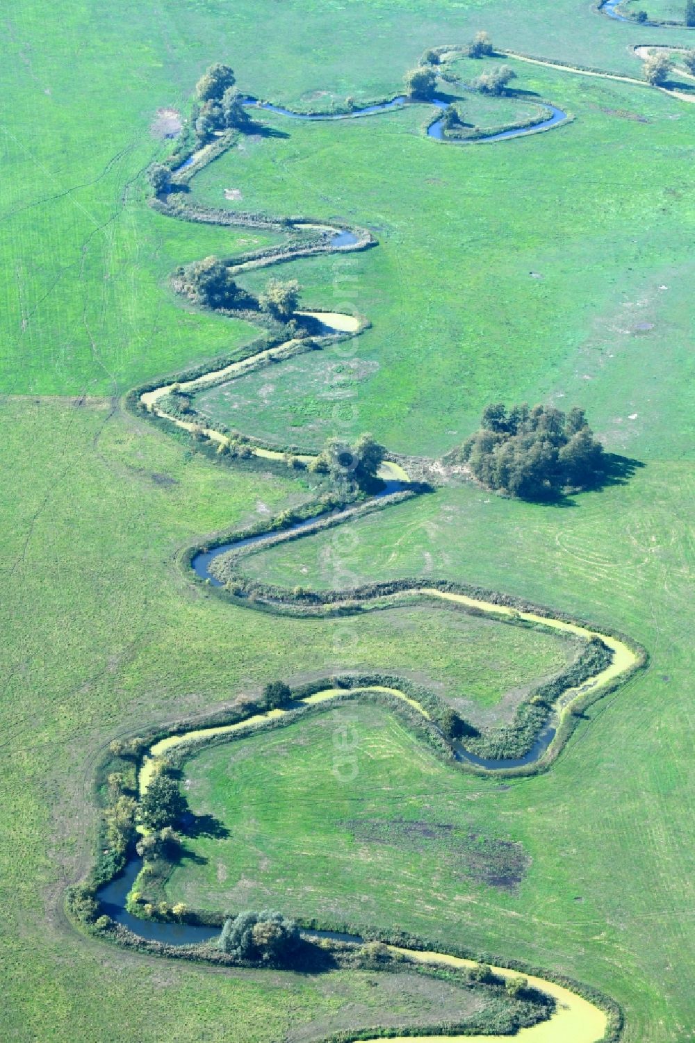 Raduhn from the bird's eye view: Curved loop of the riparian zones on the course of the river of Elde in Raduhn in the state Mecklenburg - Western Pomerania, Germany