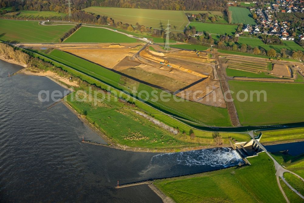 Voerde (Niederrhein) from above - Riparian areas along the river mouth der Emscher in den Rhein mit Baustelle zum Umbau der Emscher- Muendung in Voerde (Niederrhein) in the state North Rhine-Westphalia