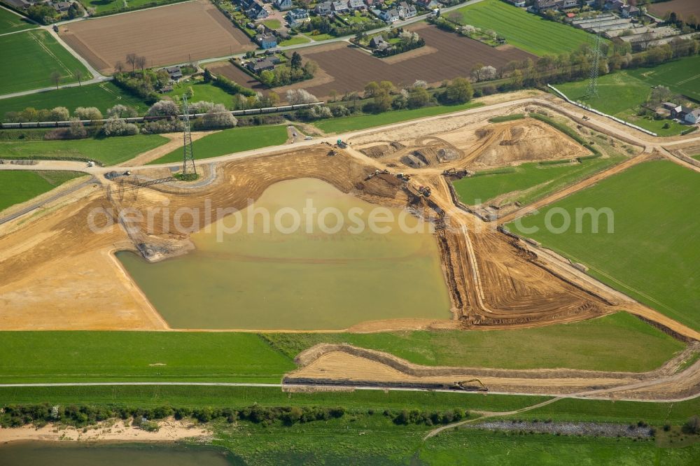 Voerde (Niederrhein) from above - Riparian areas along the river mouth der Emscher in den Rhein mit Baustelle zum Umbau der Emscher- Muendung in Voerde (Niederrhein) in the state North Rhine-Westphalia