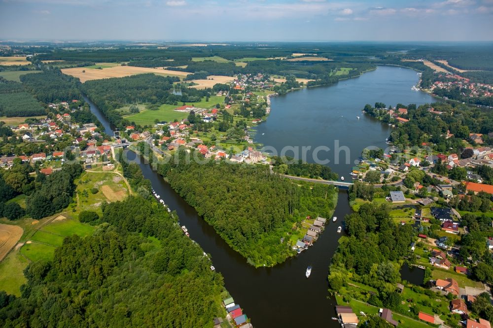 Mirow from the bird's eye view: Riparian areas along the river mouth des Mirower Kanals in den Mirower See in Mirow in the state Mecklenburg - Western Pomerania