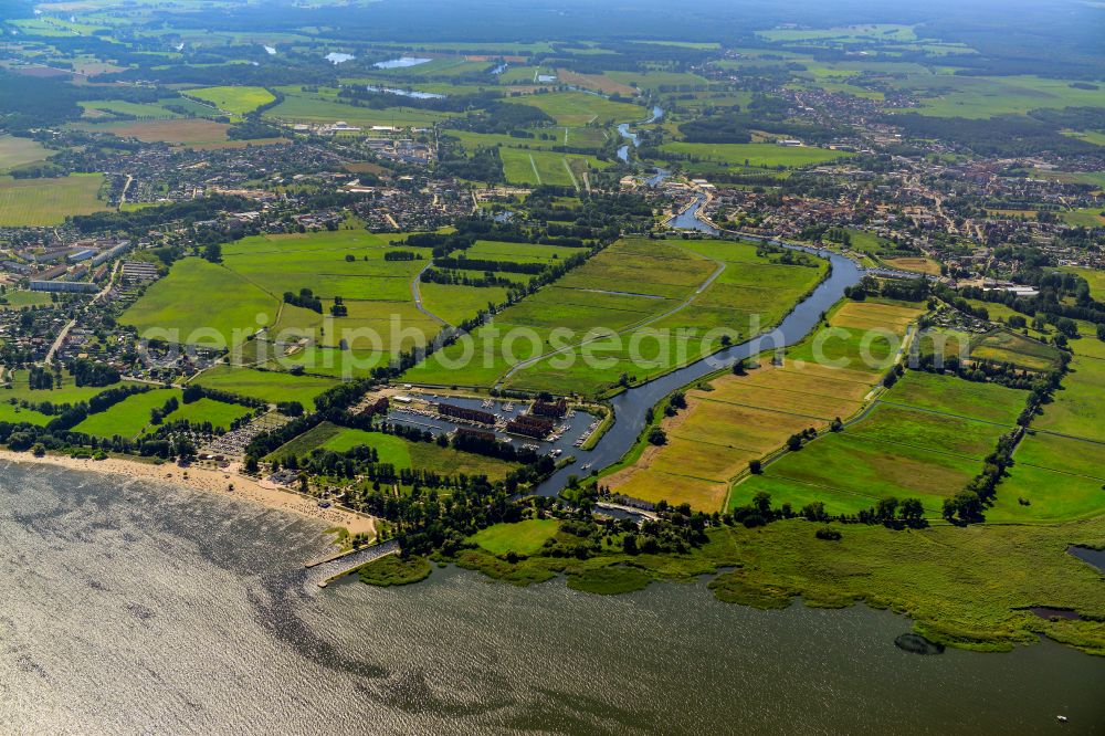 Ueckermünde from the bird's eye view: Riparian areas along the river mouth of Uecker in Ueckermuende in the state Mecklenburg - Western Pomerania, Germany