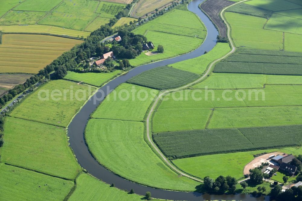 Aerial photograph Loxstedt - Riparian zones on the course of the river Alte Lune in Loxstedt in the state Lower Saxony