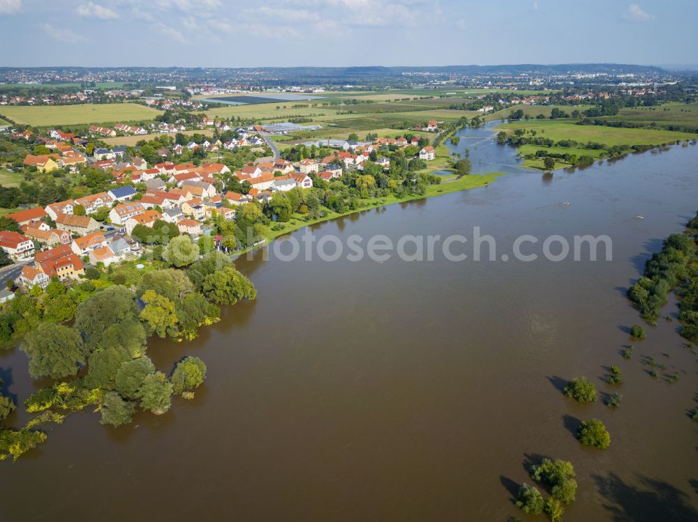 Scharfenberg from above - Bank areas during flooding along the river Elbe in Soernewitz am Spaargebirge in the federal state of Saxony