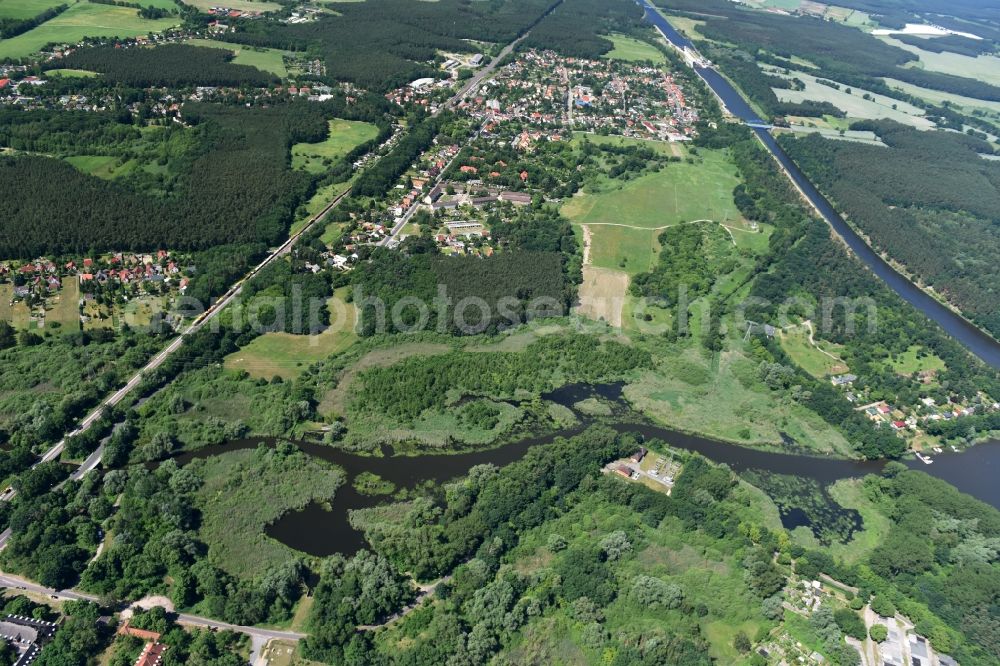 Aerial photograph Wusterwitz - Course of the river Die Fahrt between Kirchmoeser and Wusterwitz in the state of Brandenburg. The river connects the lakes Wendsee in the North and Grosser Wusterwitzer See in the South. View from the East to Wusterwitz. Elbe-Havel-Canal takes its course in the North of the town