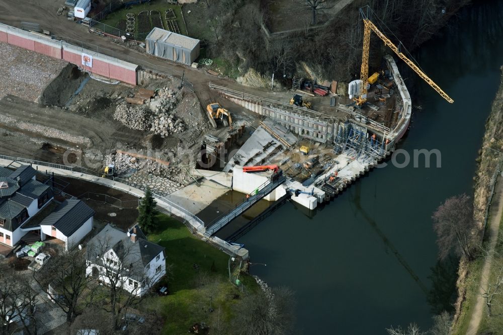 Döbeln from the bird's eye view: Expansion and securing construction sites to the shore areas of the river course of Flutmulde in Doebeln in Saxony