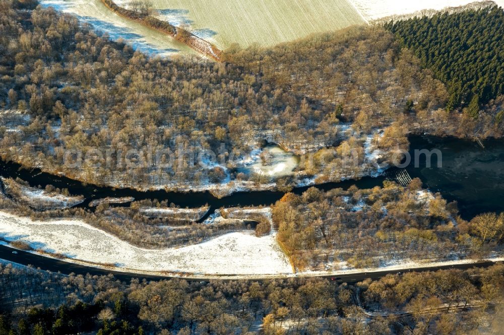 Neheim from the bird's eye view: Riparian zones on the course of the river Moehne in Neheim in the state North Rhine-Westphalia