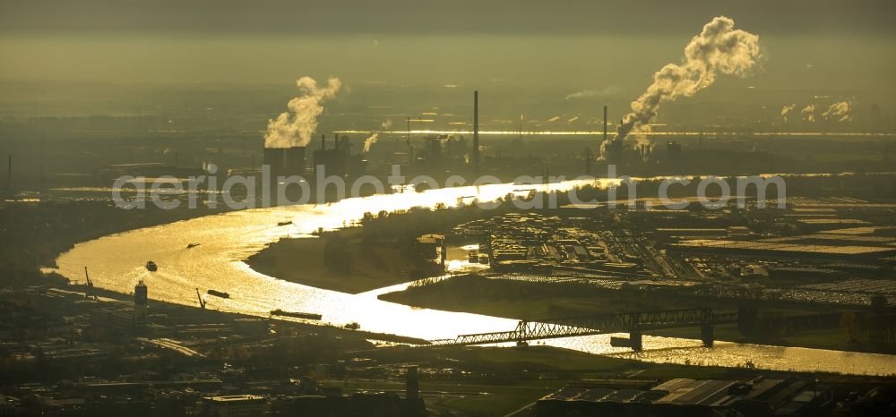 Aerial image Duisburg - Riparian zones on the course of the river Rhein beim Sonnenuntergang in Duisburg in the state North Rhine-Westphalia