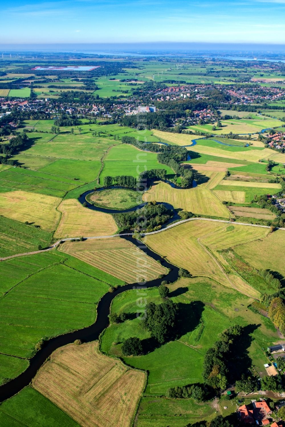 Stade from above - Curved loop of the riparian zones on the course of the river in Stade in the state Lower Saxony, Germany