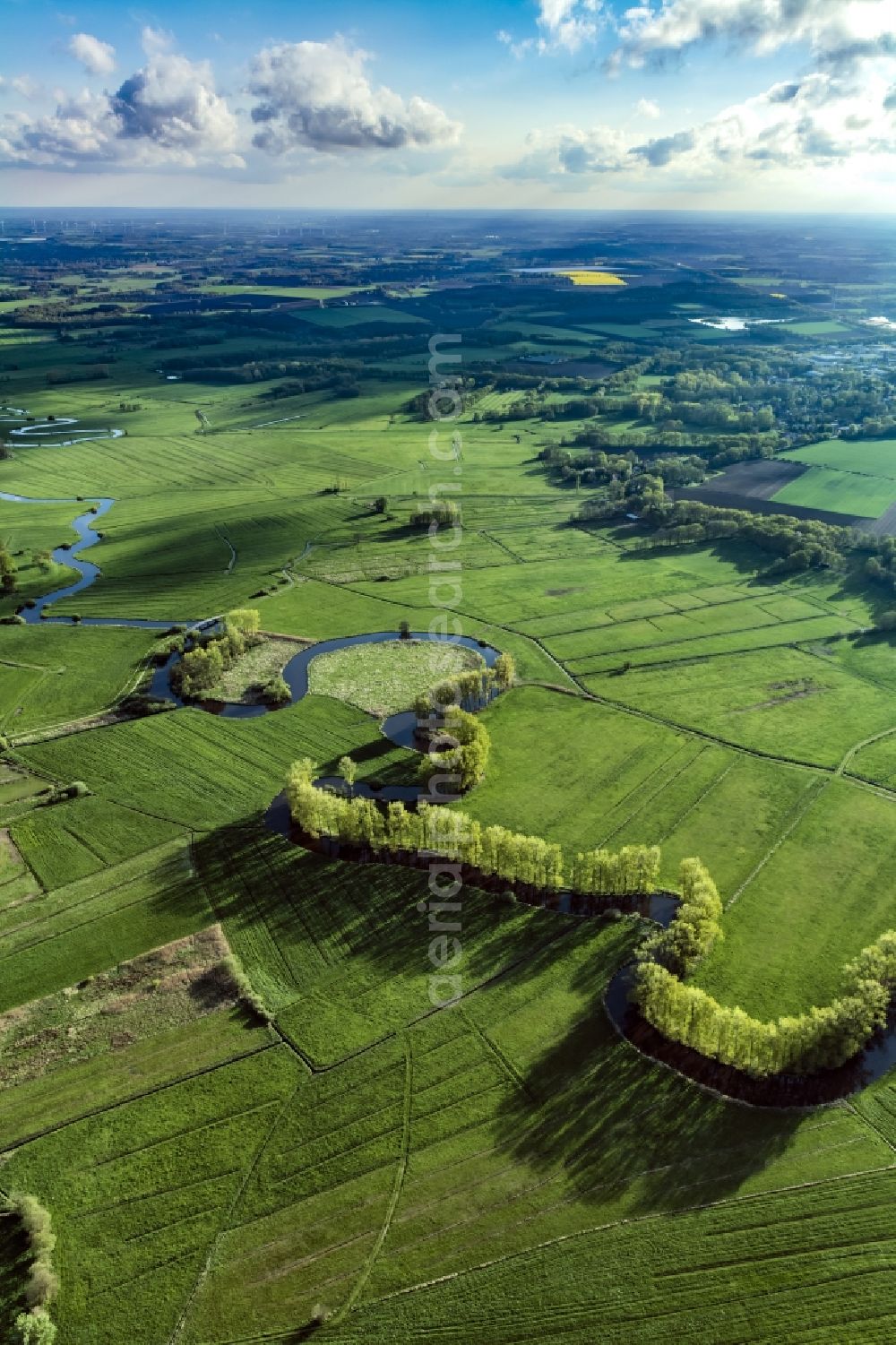 Stade from above - Curved loop of the riparian zones on the course of the river in Stade in the state Lower Saxony, Germany