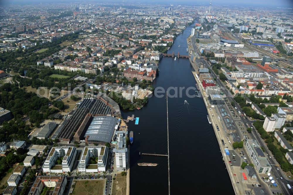 Berlin from the bird's eye view: Shore areas on the Spree flux flow to the developing area Mediaspree on the former east port in Friedrichshain in Berlin