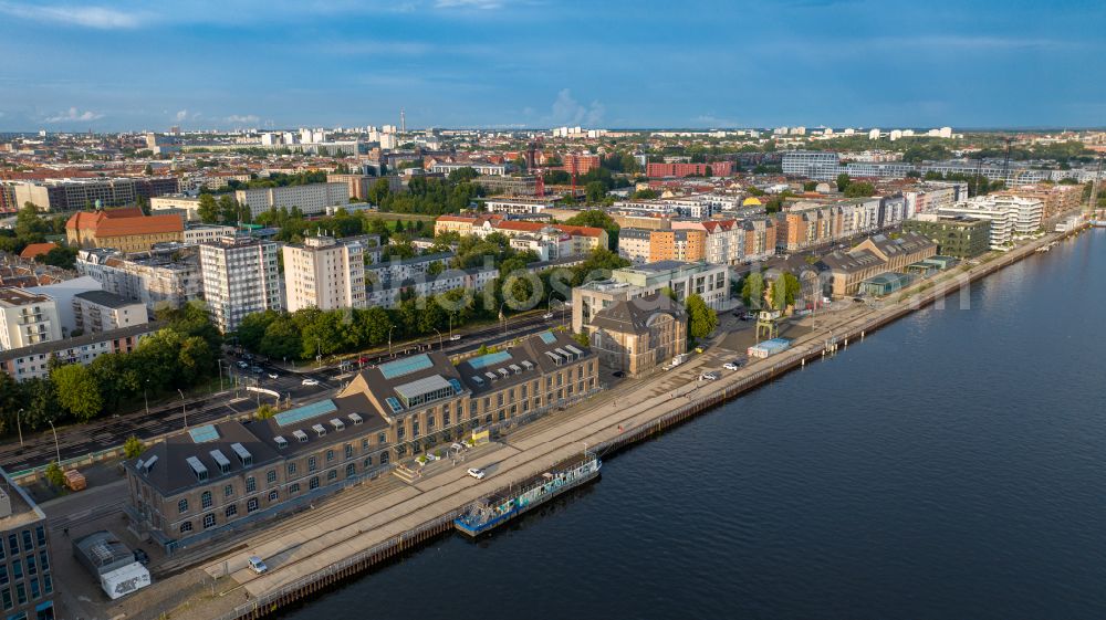 Berlin from above - Riparian zones on the course of the river of Spree on Osthafen in the district Friedrichshain in Berlin, Germany