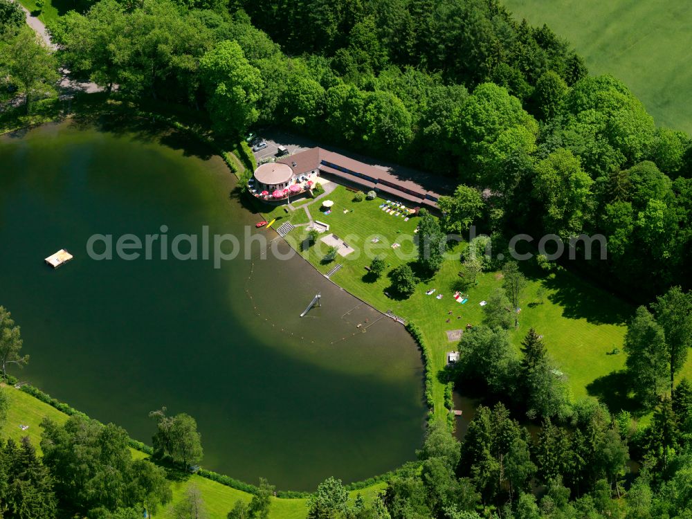 Ochsenhausen from above - Beach areas on the Naturfreibad Ziegelweiher at the lake Ziegelweiher in Ochsenhausen in the state Baden-Wuerttemberg, Germany