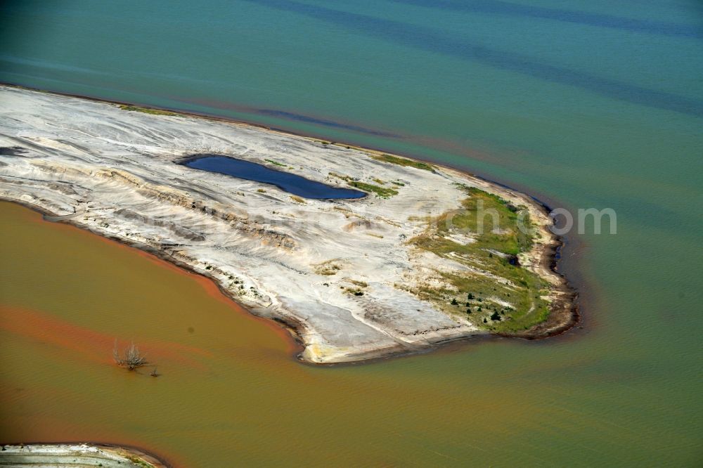 Luckau from above - Shore areas of flooded former lignite opencast mine and renaturation lake Schlabendorfer See in Luckau in the state Brandenburg