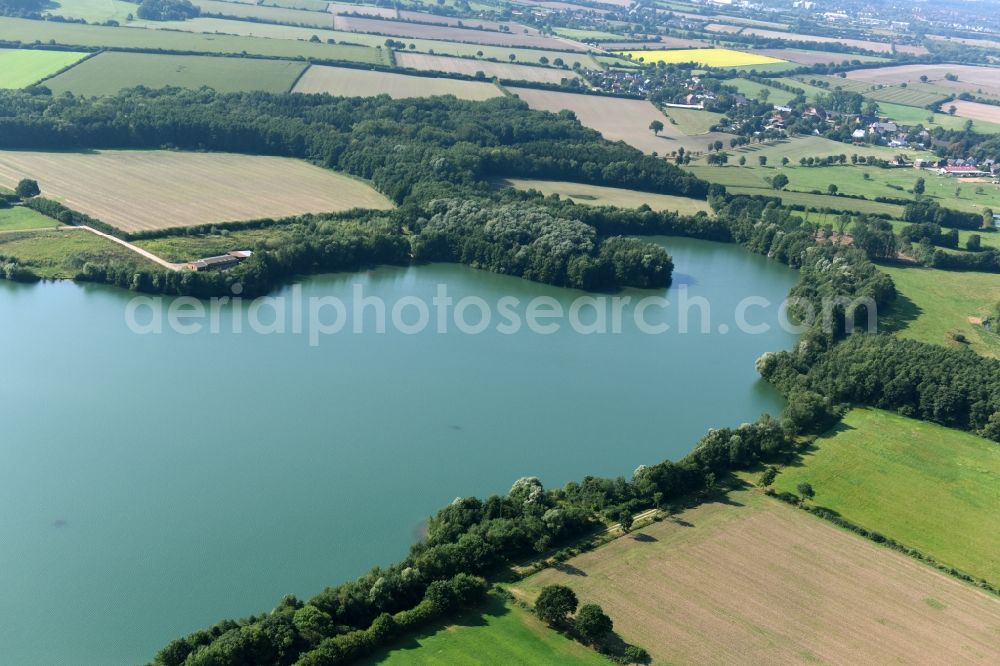 Groß Pampau from the bird's eye view: Shore areas of flooded former lignite opencast mine and renaturation lake nahe Gross Pampau in the state Schleswig-Holstein