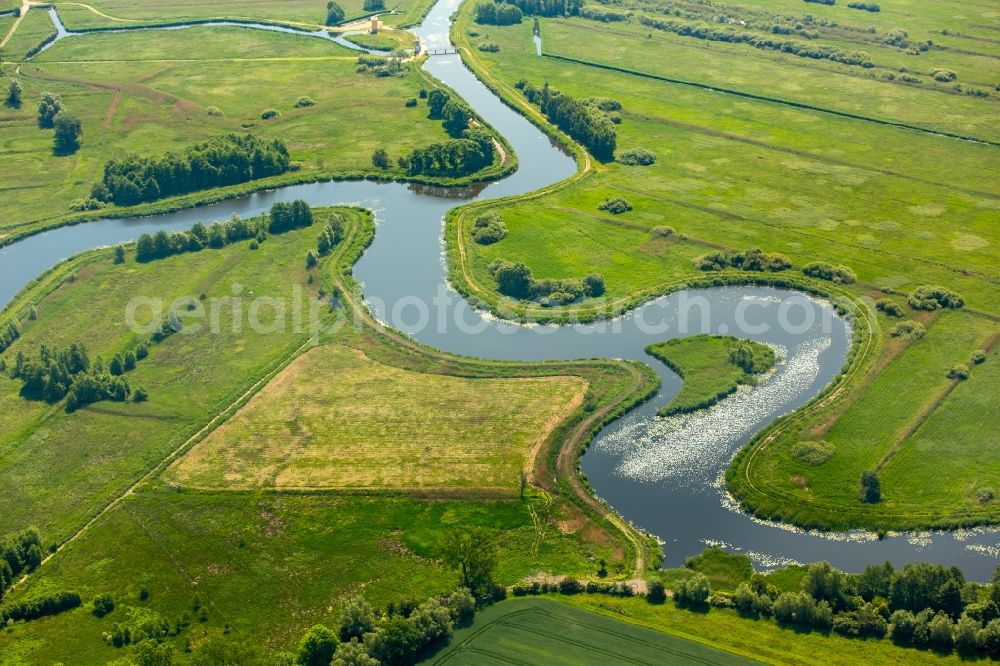 Grabowo from the bird's eye view: Curved loop of the riparian zones on the course of the river Grabow- in Grabowo in West Pomerania, Poland