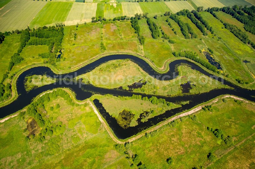 Grabowo from the bird's eye view: Curved loop of the riparian zones on the course of the river Grabow- in Grabowo in West Pomerania, Poland